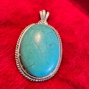 Turquoise Oval Pendant with Silver Trim